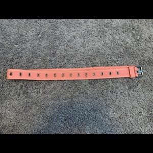 pink grommet belt
